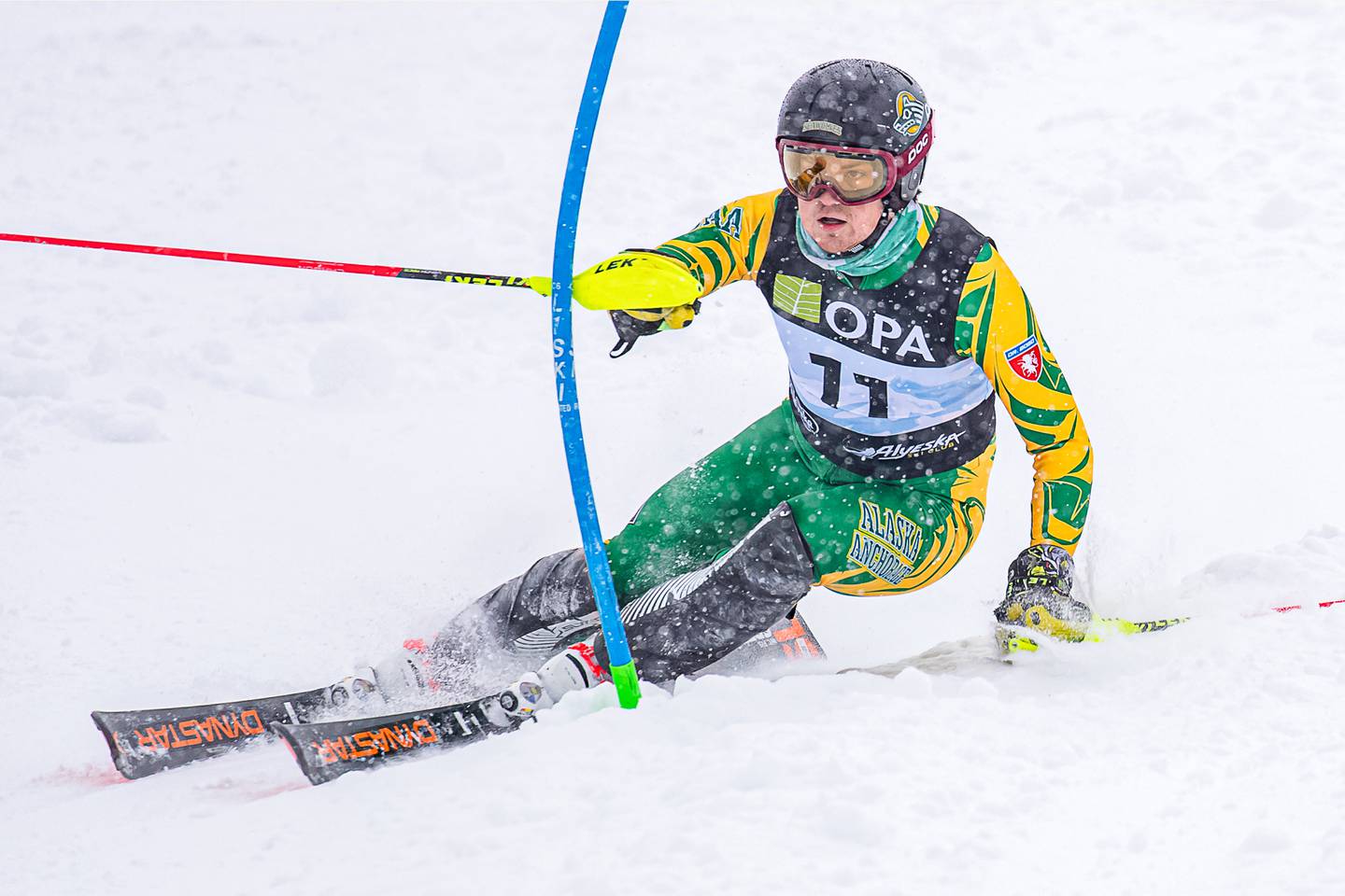 UAA senior Michael Soetaert clears a gate on his way to victory in the final race of his FIS racing career on Thursday, March 25, 2021 at snowy Alyeska Ski Resort. Soetaert won the second of two slalom races at the Western Region FIS Tech Series. (Photo by Bob Eastaugh)